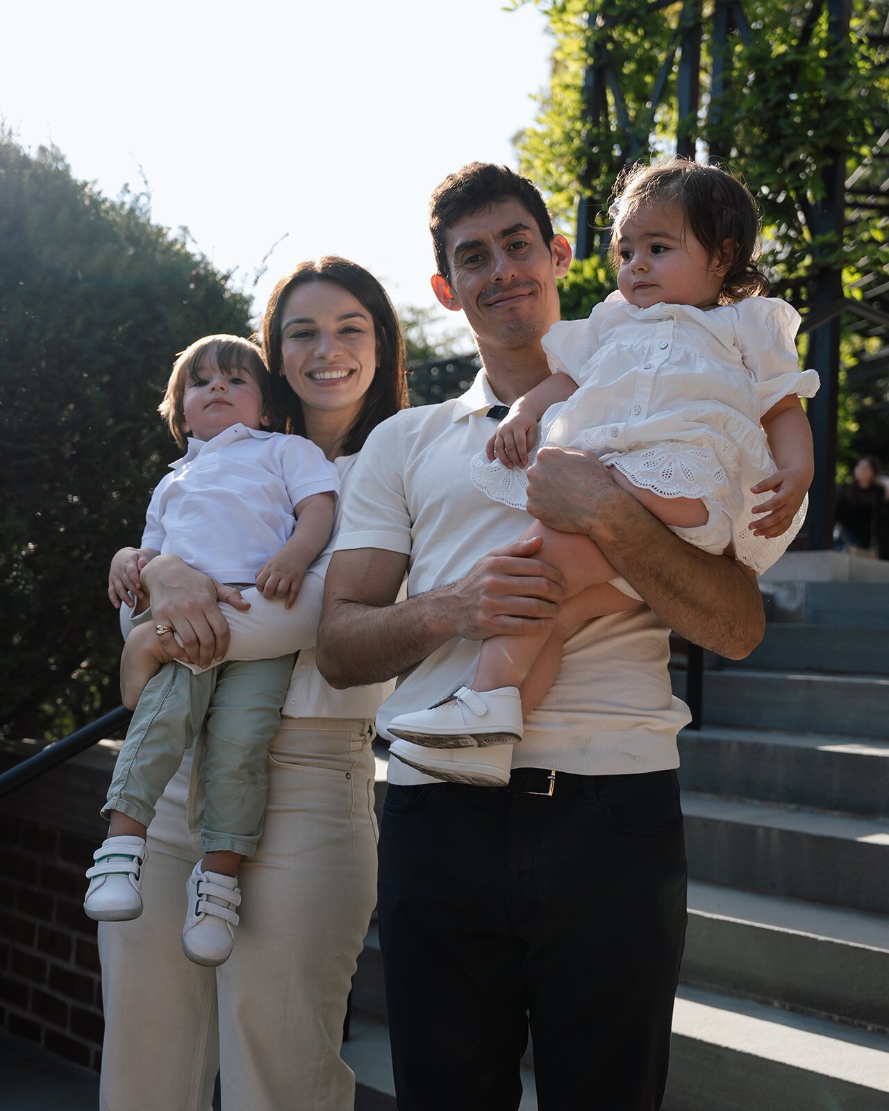 Andrew Metros with his wife and two children